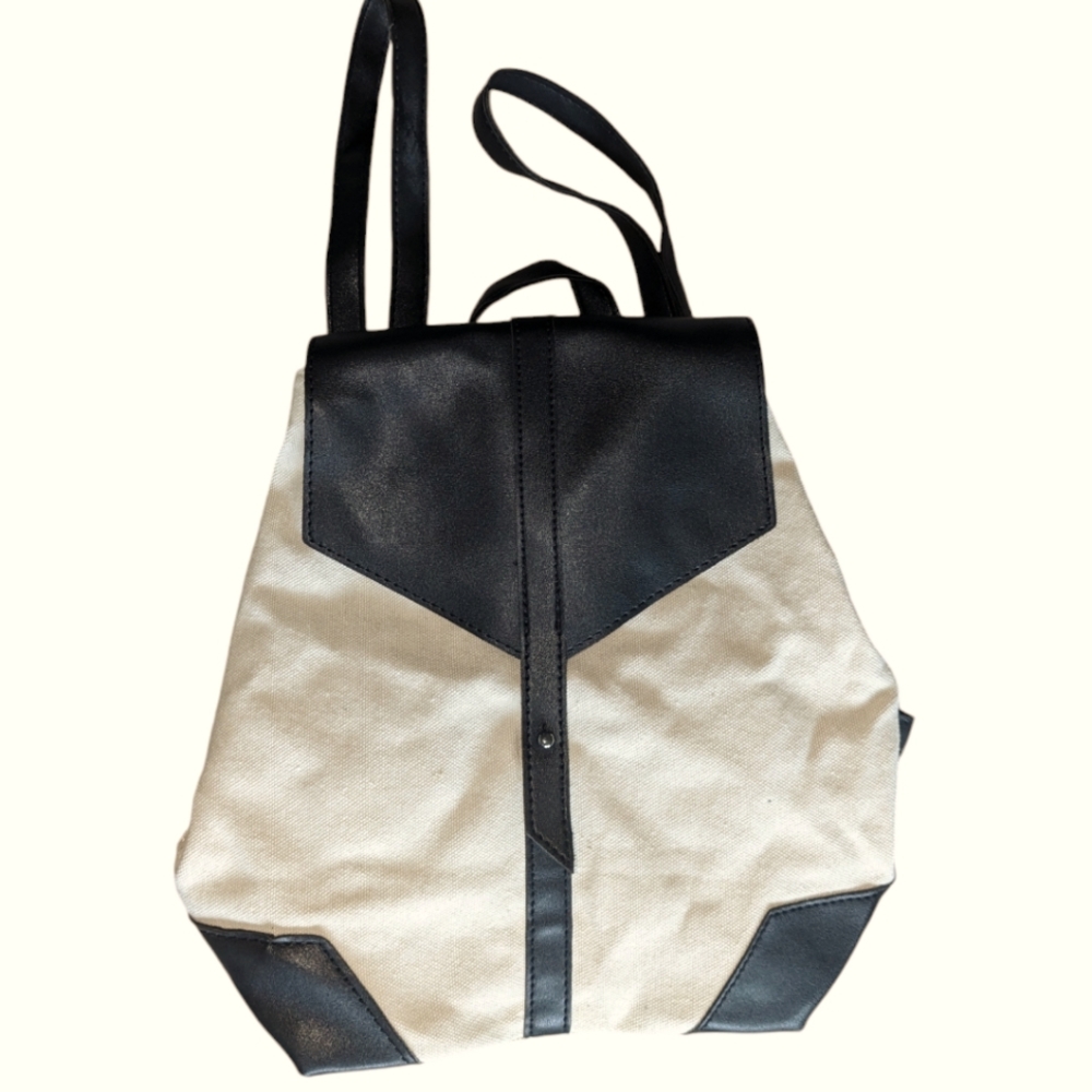 Deux Lux cream canvas backpack with black leather details